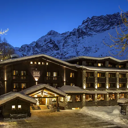 Отель Hermitage Relais & Chateaux